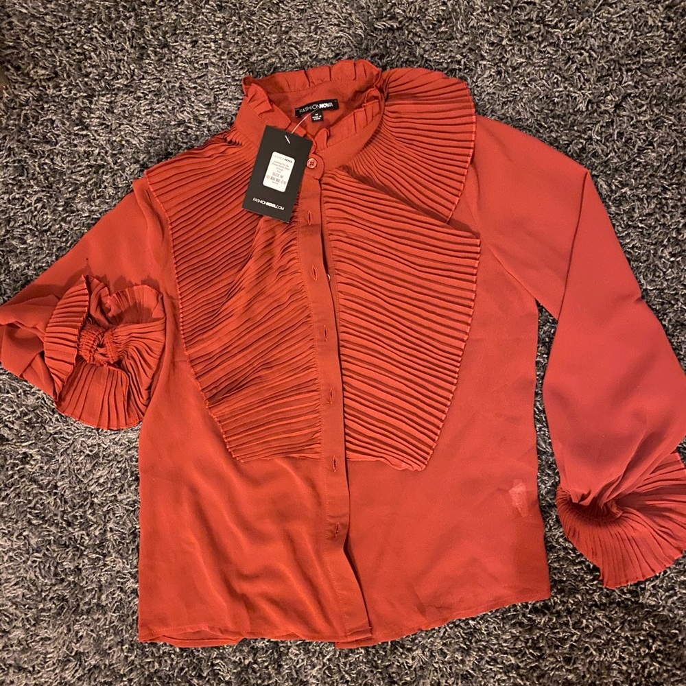 Rust ruffled blouse